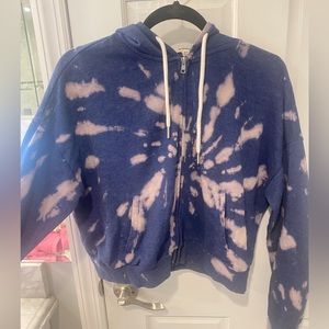 Medium, acid washed, blue zip up from the brand garage